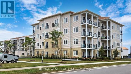 118 - 50 Lakebreeze Drive, Clarington (Newcastle), ON - Outdoor With Balcony With Facade