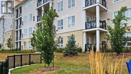 118 - 50 Lakebreeze Drive, Clarington (Newcastle), ON - Outdoor With Balcony With Facade