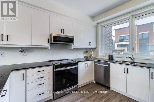 767 Heathrow Path N, Oshawa (Samac), ON - Indoor Photo Showing Kitchen With Double Sink