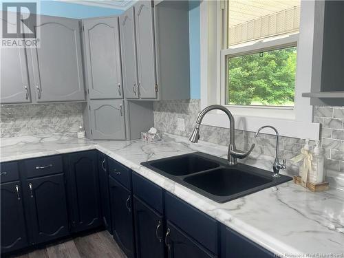 54 Logue Road, Minto, NB - Indoor Photo Showing Kitchen With Double Sink