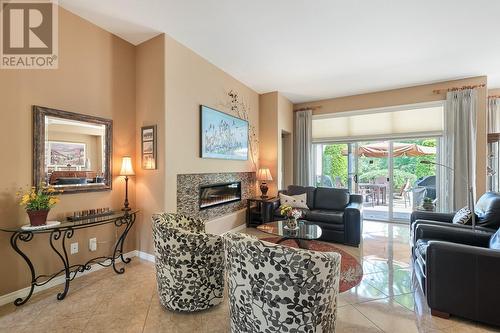 3989 Gallaghers Parkland Drive, Kelowna, BC - Indoor Photo Showing Living Room With Fireplace