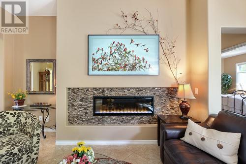 3989 Gallaghers Parkland Drive, Kelowna, BC - Indoor Photo Showing Living Room With Fireplace