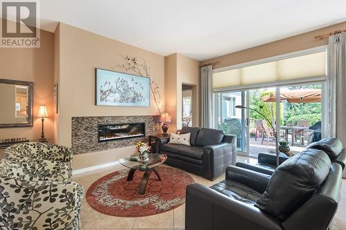 3989 Gallaghers Parkland Drive, Kelowna, BC - Indoor Photo Showing Living Room With Fireplace