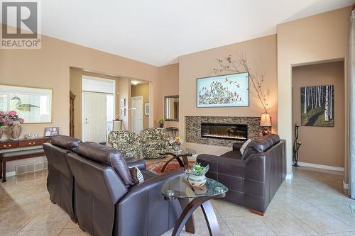 3989 Gallaghers Parkland Drive, Kelowna, BC - Indoor Photo Showing Living Room With Fireplace