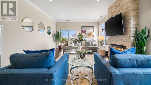 1403 - 240 Villagewalk Boulevard, London, ON - Indoor Photo Showing Living Room With Fireplace