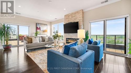 1403 - 240 Villagewalk Boulevard, London, ON - Indoor Photo Showing Living Room With Fireplace