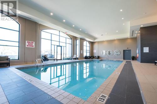 1403 - 240 Villagewalk Boulevard, London, ON - Indoor Photo Showing Other Room With In Ground Pool