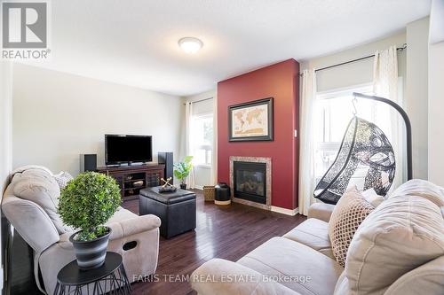 22 Commonwealth Road, Barrie (Innis-Shore), ON - Indoor Photo Showing Living Room With Fireplace