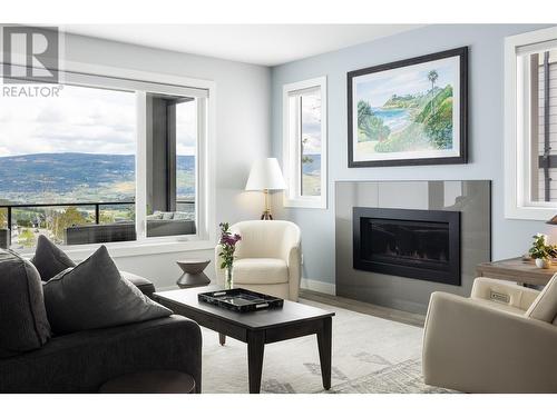 1349 Rocky Point Drive Unit# 15, Kelowna, BC - Indoor Photo Showing Living Room With Fireplace