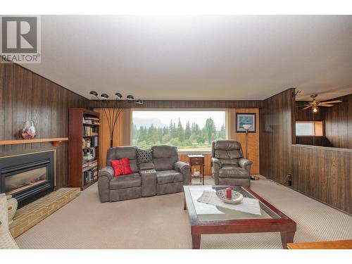 309 Albers Road, Lumby, BC - Indoor Photo Showing Living Room With Fireplace