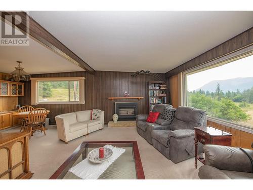 309 Albers Road, Lumby, BC - Indoor Photo Showing Living Room With Fireplace