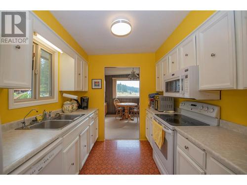 309 Albers Road, Lumby, BC - Indoor Photo Showing Kitchen With Double Sink