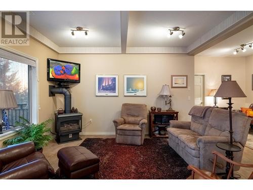 8215 Silver Star Road, Vernon, BC - Indoor Photo Showing Living Room With Fireplace