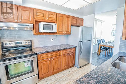 1611 - 7 Bishop Avenue, Toronto (Newtonbrook East), ON - Indoor Photo Showing Kitchen With Stainless Steel Kitchen With Double Sink