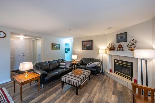 404-1750 Atkinson Street, Penticton, BC - Indoor Photo Showing Living Room With Fireplace