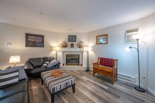 404-1750 Atkinson Street, Penticton, BC - Indoor Photo Showing Living Room With Fireplace