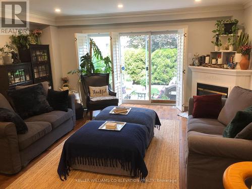 3 - 1050 Grand Boulevard, Oakville (Iroquois Ridge South), ON - Indoor Photo Showing Living Room With Fireplace