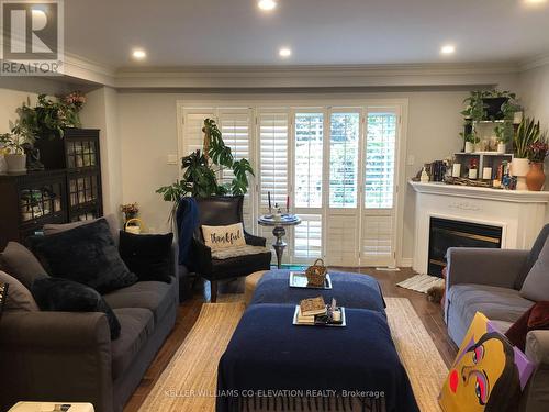 3 - 1050 Grand Boulevard, Oakville (Iroquois Ridge South), ON - Indoor Photo Showing Living Room With Fireplace