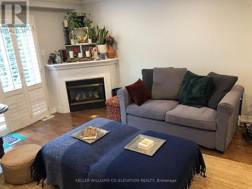 3 - 1050 Grand Boulevard, Oakville (Iroquois Ridge South), ON - Indoor Photo Showing Living Room With Fireplace