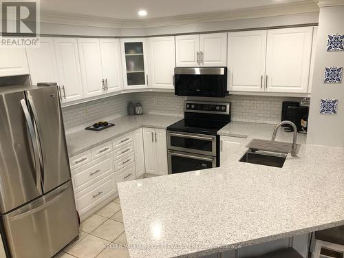 3 - 1050 Grand Boulevard, Oakville (Iroquois Ridge South), ON - Indoor Photo Showing Kitchen With Stainless Steel Kitchen With Upgraded Kitchen