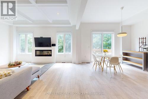 1409 Blackmore Street N, Innisfil, ON - Indoor Photo Showing Other Room With Fireplace