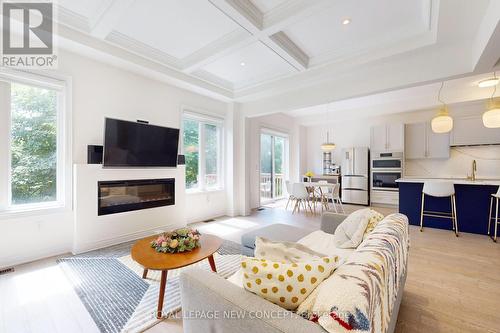 1409 Blackmore Street N, Innisfil, ON - Indoor Photo Showing Living Room With Fireplace