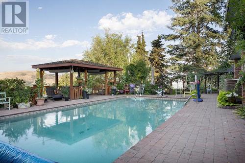 486 Terrace Drive, Coldstream, BC - Outdoor With In Ground Pool With Backyard