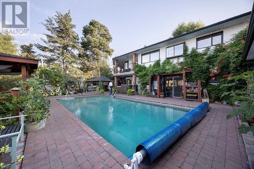 486 Terrace Drive, Coldstream, BC - Outdoor With In Ground Pool