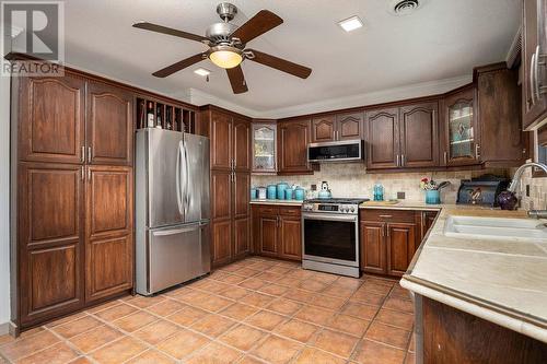 486 Terrace Drive, Coldstream, BC - Indoor Photo Showing Kitchen With Double Sink