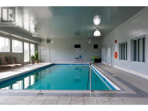 2365 Stillingfleet Road Unit# 75, Kelowna, BC - Indoor Photo Showing Other Room With In Ground Pool