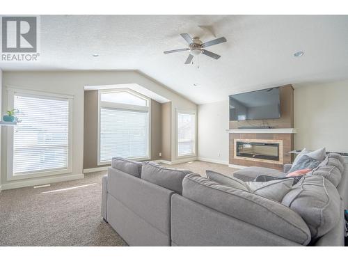 7657 Stillwater Crescent, Prince George, BC - Indoor Photo Showing Living Room With Fireplace