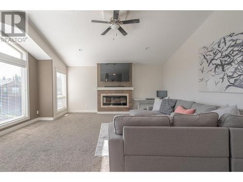 7657 Stillwater Crescent, Prince George, BC - Indoor Photo Showing Living Room With Fireplace