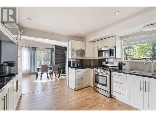 694 Mcclure Road, Kelowna, BC - Indoor Photo Showing Kitchen With Upgraded Kitchen