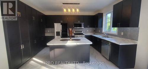 30 Moreau Way, Springwater (Minesing), ON - Indoor Photo Showing Kitchen With Double Sink