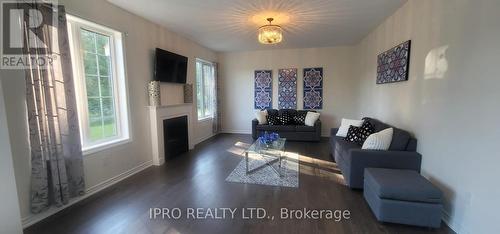 30 Moreau Way, Springwater (Minesing), ON - Indoor Photo Showing Living Room With Fireplace