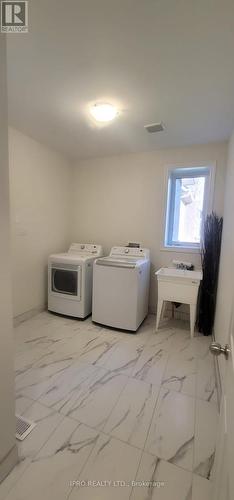 30 Moreau Way, Springwater (Minesing), ON - Indoor Photo Showing Laundry Room