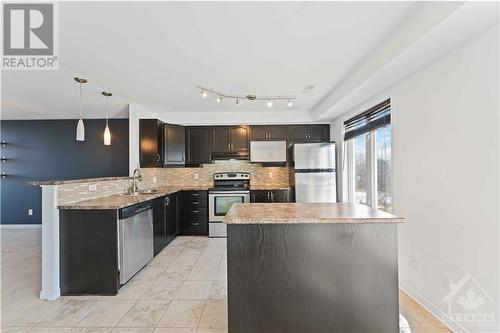 236 Tivoli Private, Ottawa, ON - Indoor Photo Showing Kitchen With Double Sink With Upgraded Kitchen