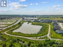 Small walking/biking trail goes around pond area. - 