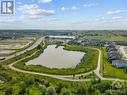 Small walking/biking trail goes around pond area. - 106 Westphalian Avenue, Ottawa, ON  - Outdoor With View 