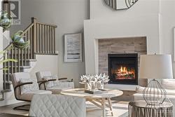 Modern 2 storey Gas fireplace detail  in cozy sitting area - 