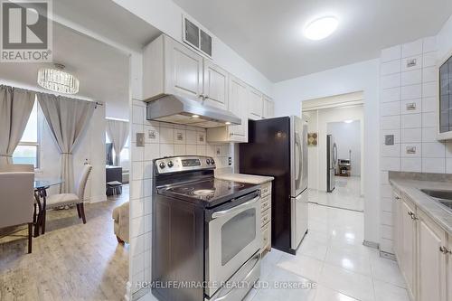 710 - 2835 Islington Avenue, Toronto (Humber Summit), ON - Indoor Photo Showing Kitchen