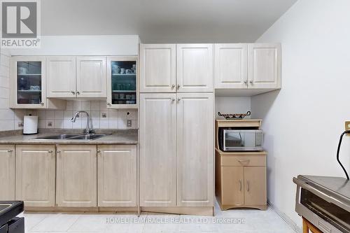 710 - 2835 Islington Avenue, Toronto (Humber Summit), ON - Indoor Photo Showing Kitchen With Double Sink