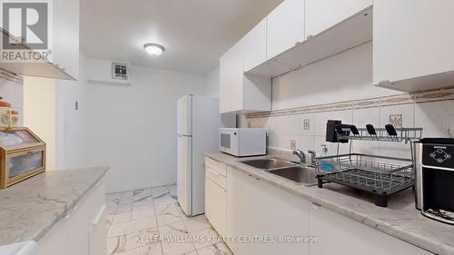 1107 - 345 Driftwood Avenue, Toronto (Black Creek), ON - Indoor Photo Showing Kitchen With Double Sink