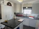 46 Kasper Crescent, Assiniboia, SK  - Indoor Photo Showing Kitchen With Double Sink 