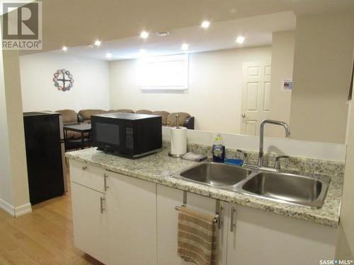 1811 20Th Street W, Saskatoon, SK - Indoor Photo Showing Kitchen With Double Sink