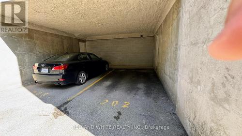 202 - 384 Erb Street W, Waterloo, ON - Indoor Photo Showing Garage