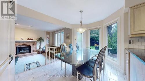 2 Garden Walk, London, ON - Indoor Photo Showing Dining Room With Fireplace