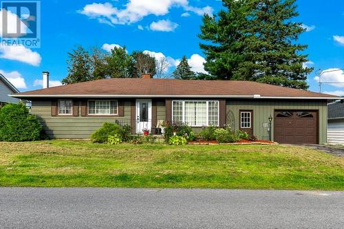 Exterior front, nice curb appeal with lovely siding & perrenial gardens! - 815 Joseph Street E, Cardinal, ON - Outdoor