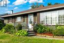 Exterior front showing oversized living room window - 815 Joseph Street E, Cardinal, ON  - Outdoor 