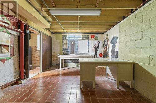 Utility room looking north-Lots of storage space & lovely hand made paintings on north wall! - 815 Joseph Street E, Cardinal, ON - Indoor